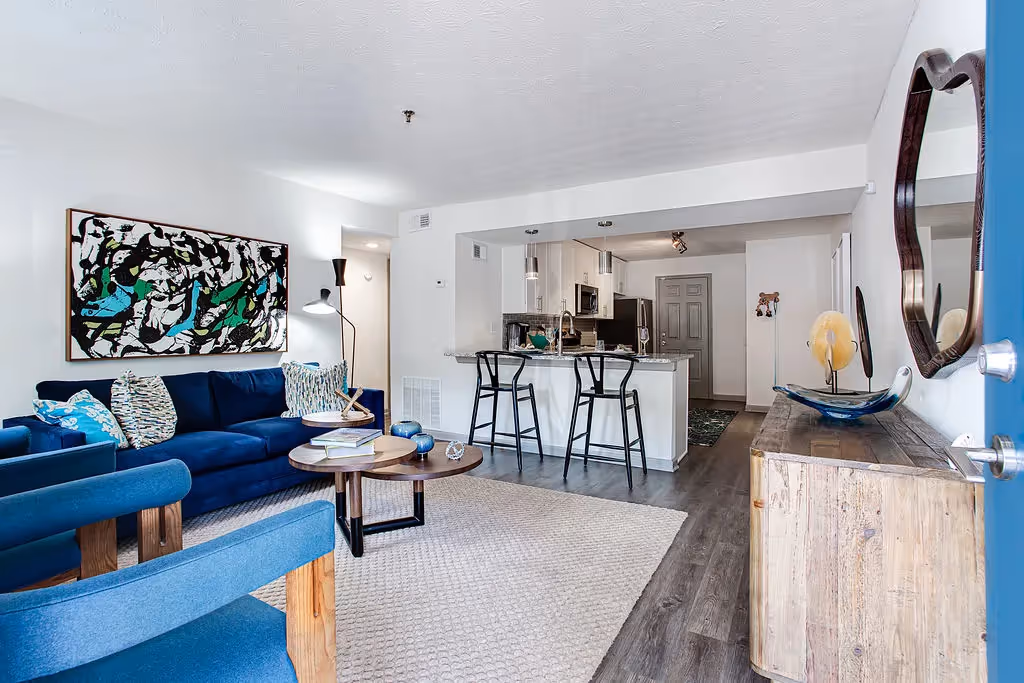 furnished living area with view of kitchen