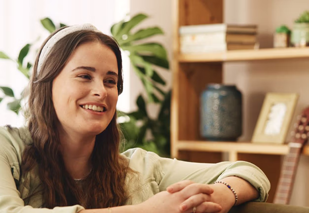 Licensed therapists in San Jose, CA, discuss treatment and personal growth during a psychotherapy session at home.