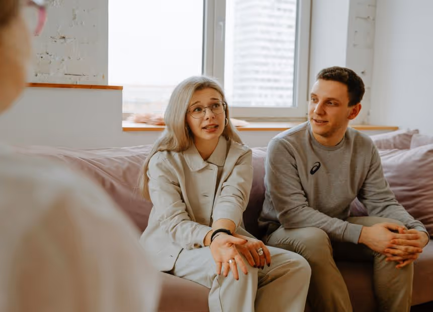 Couple discussing communication difficulties in counseling session, fostering supportive relationships in San Jose, CA.