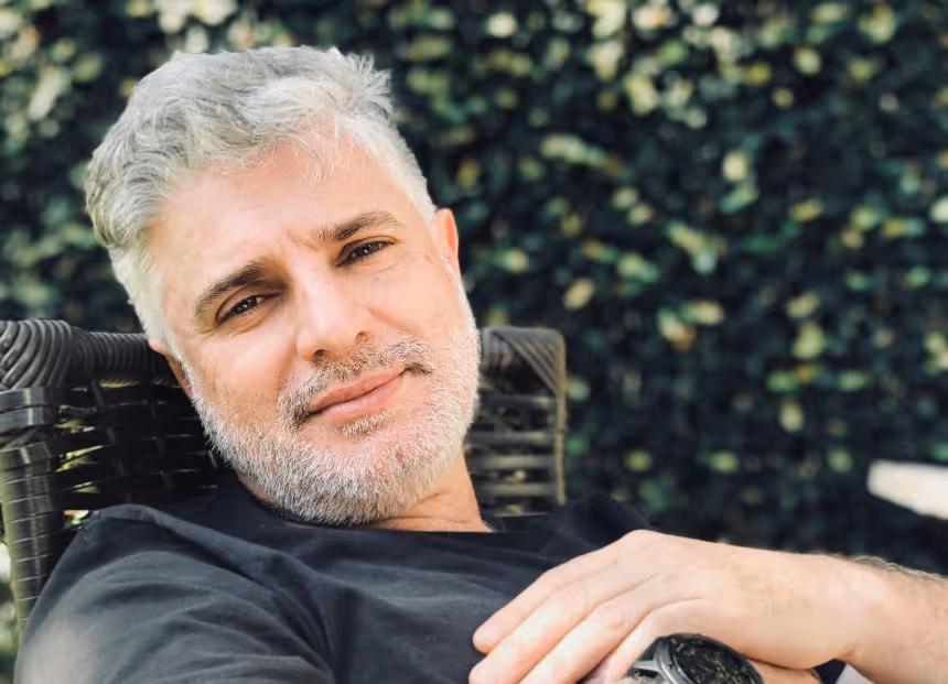 Man in chair, during therapy session on Adjustment Disorders, stress management, and healthy coping.