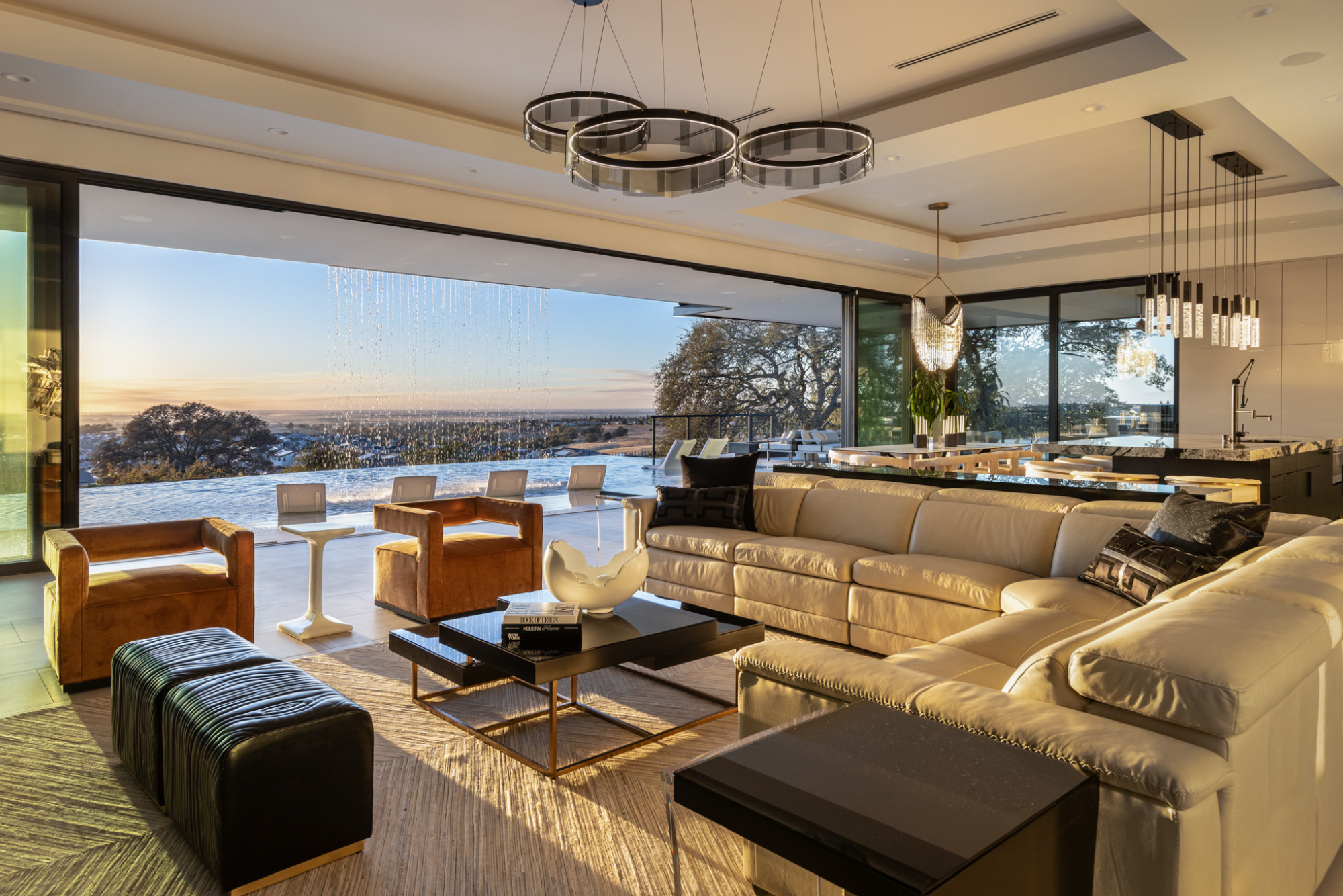 Contemporary living room with leather sectional, modern decor, and scenic views in Lincoln, CA.