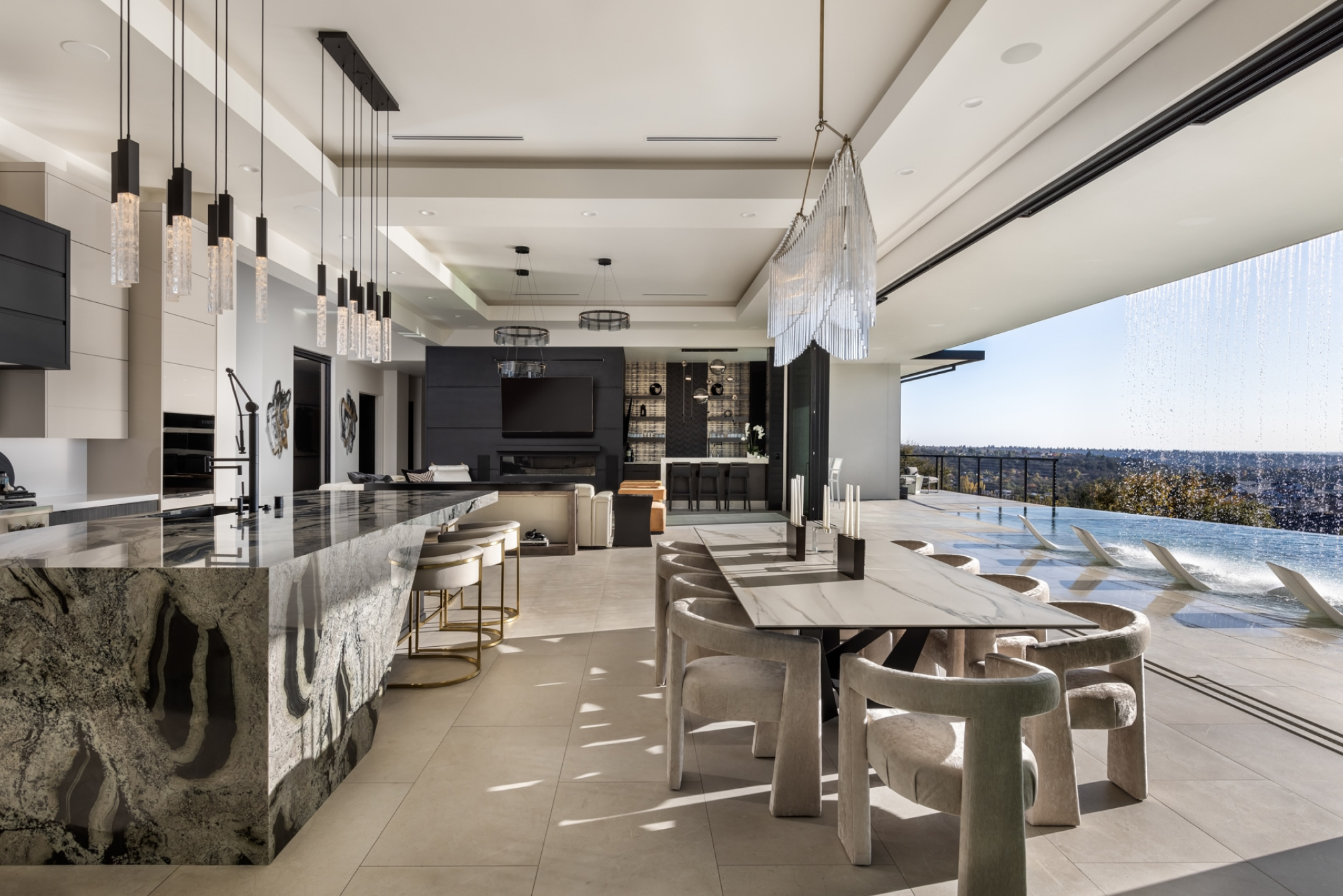 Modern kitchen and dining area featuring elegant lighting and luxurious finishes in Lincoln, CA