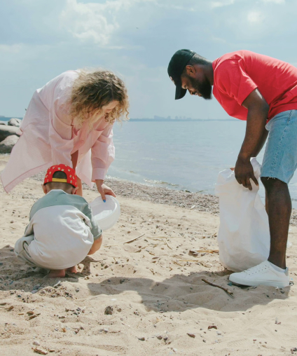 Community volunteers participating in environmental cleanup initiative at beach