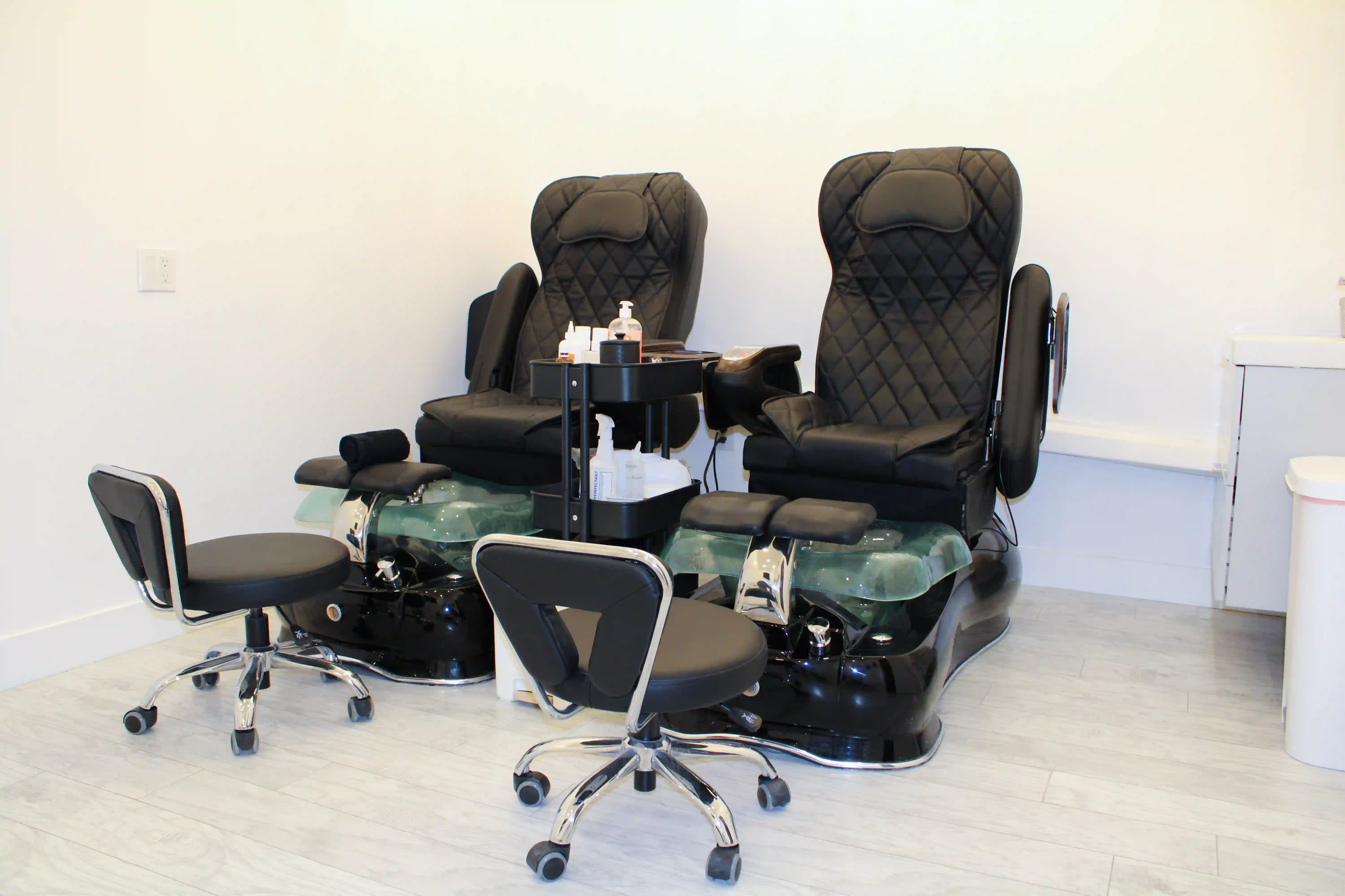 Spa massage chairs in nails room.