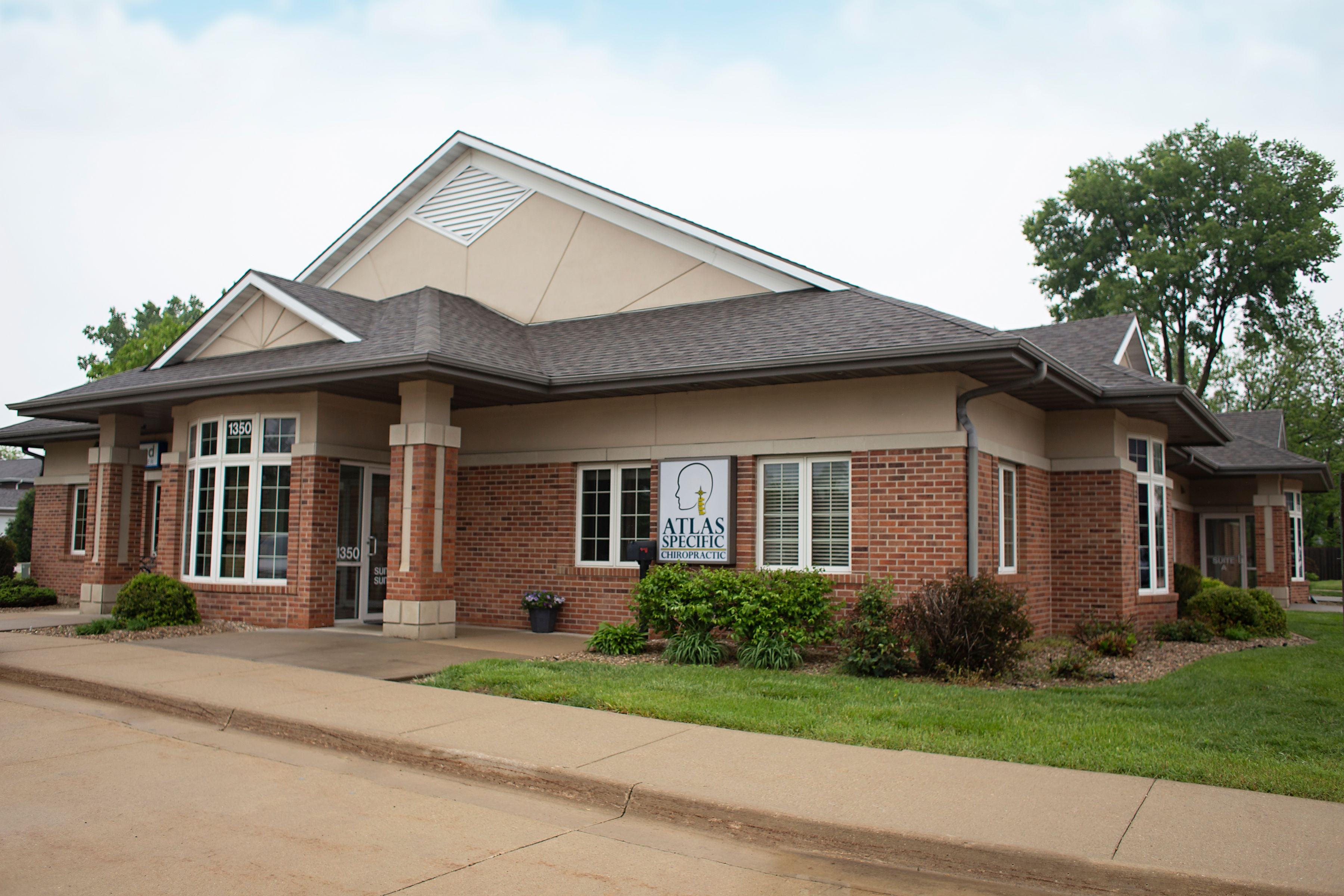 Atlas Specific Chiropractic 1350 Blairs Ferry Road, Suite B, Hiawatha, IA 52233 view from the parking lot.