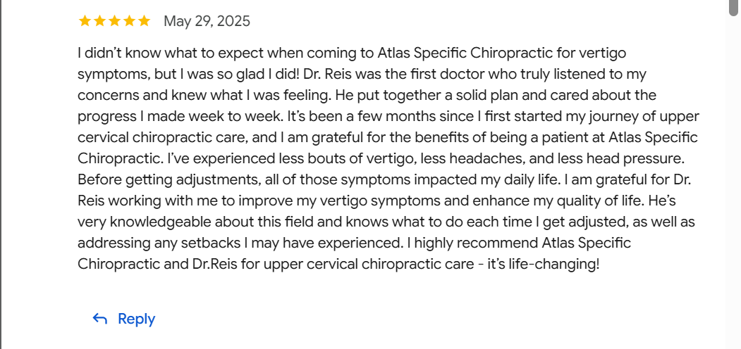 Five-star review from May 29, 2025, praising Dr. Reis and Atlas Specific Chiropractic for vertigo relief.