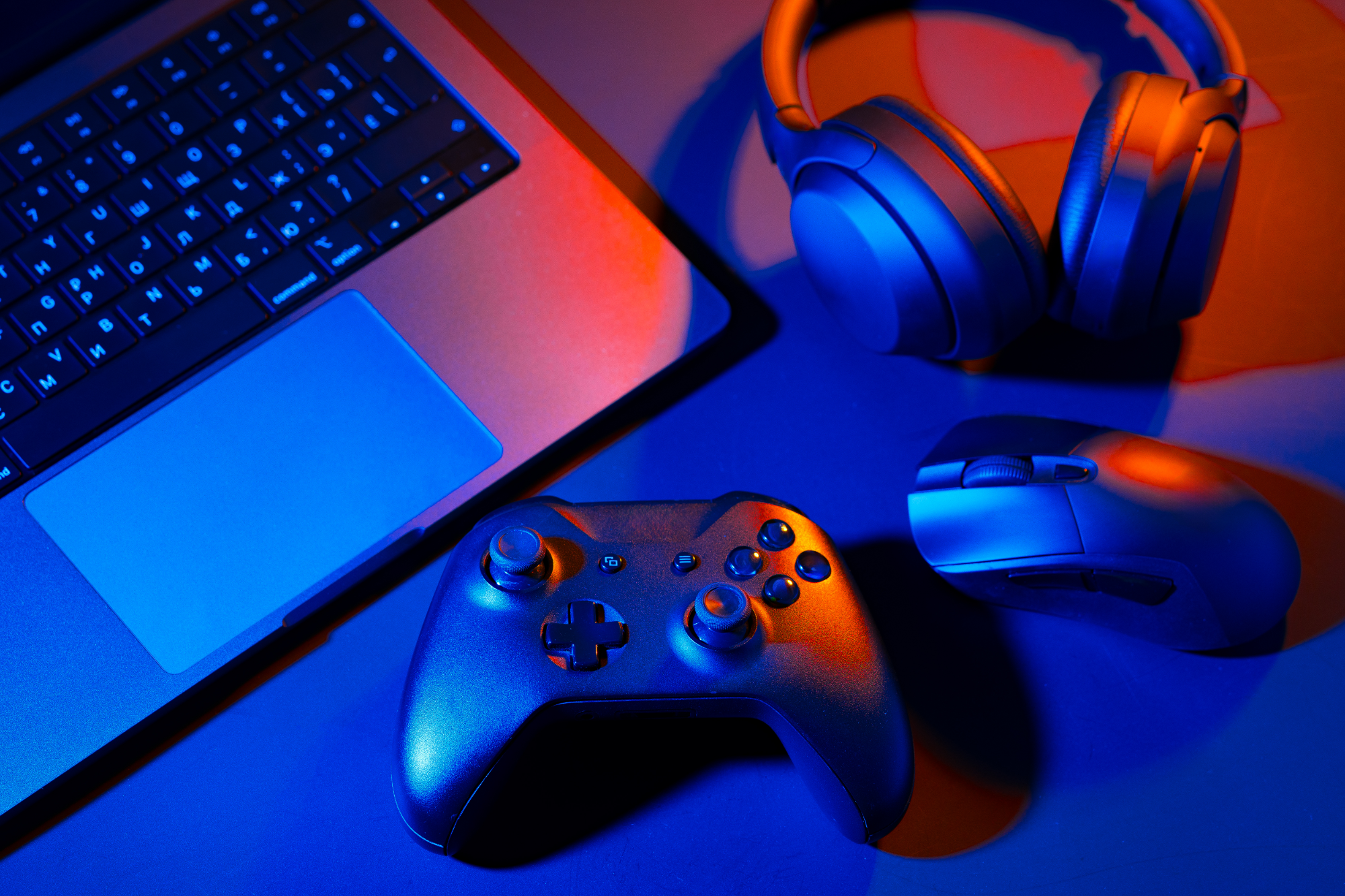 Photo of laptop and gaming controller