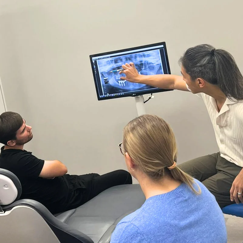Dr. Ni showing a dental preview