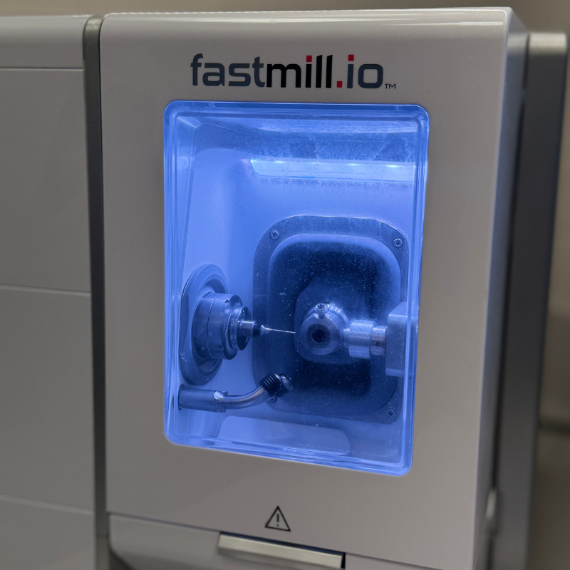 Milling machine to make dental appliances