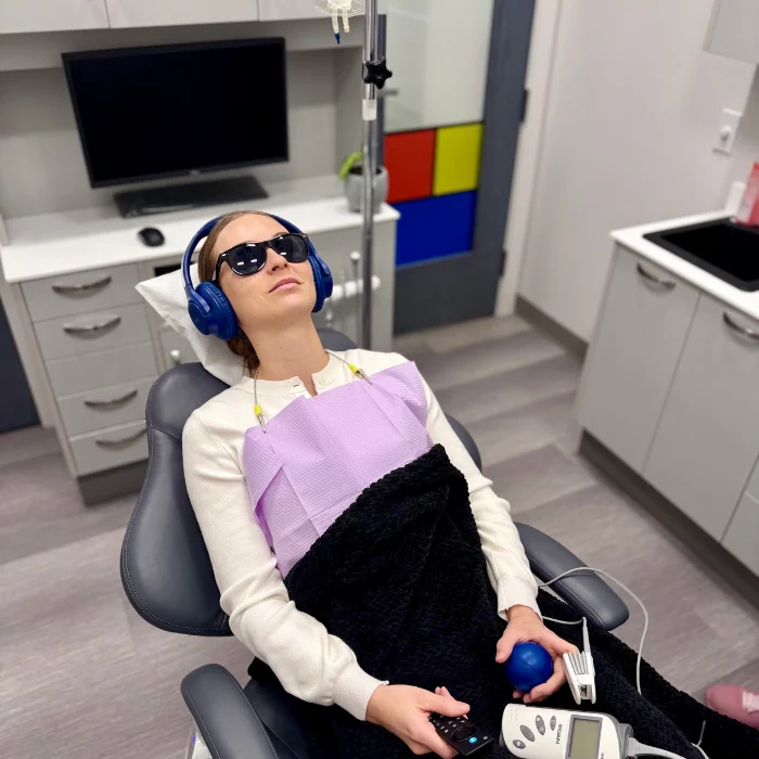 Patient sedated in dentist chair