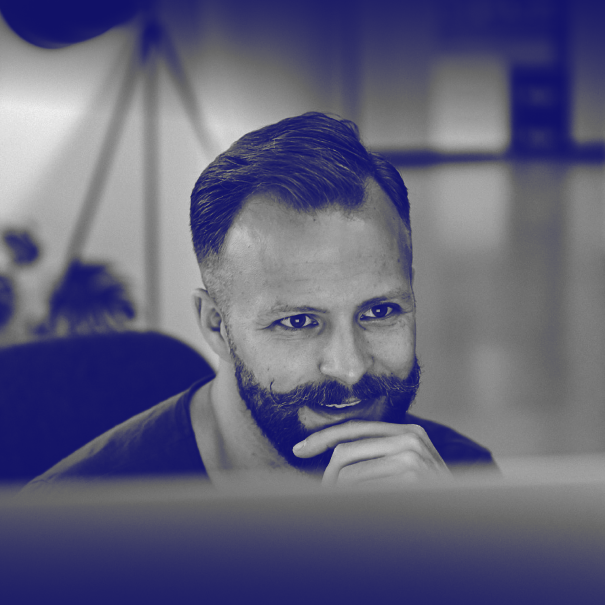 Sean Loomis Sitting at a Desktop Computer