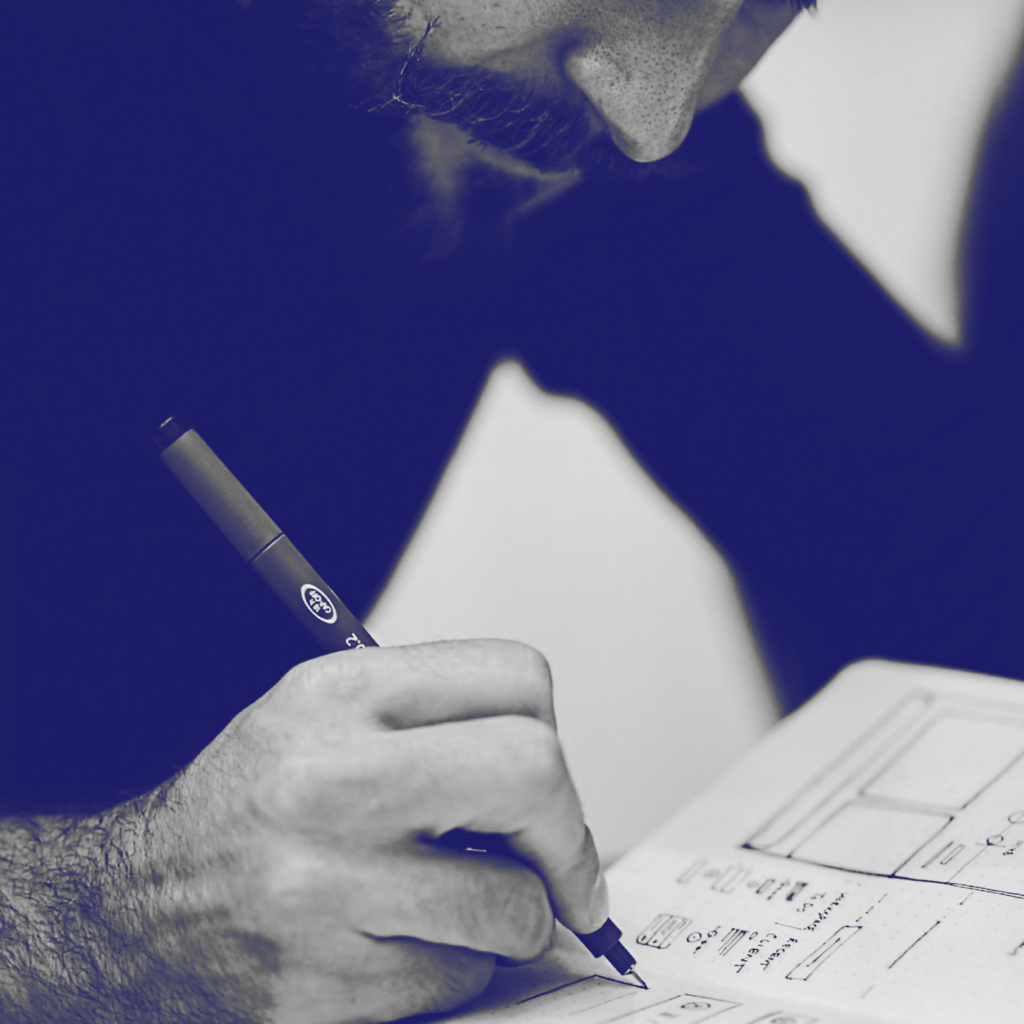 Sean Loomis Sketching in His Notebook