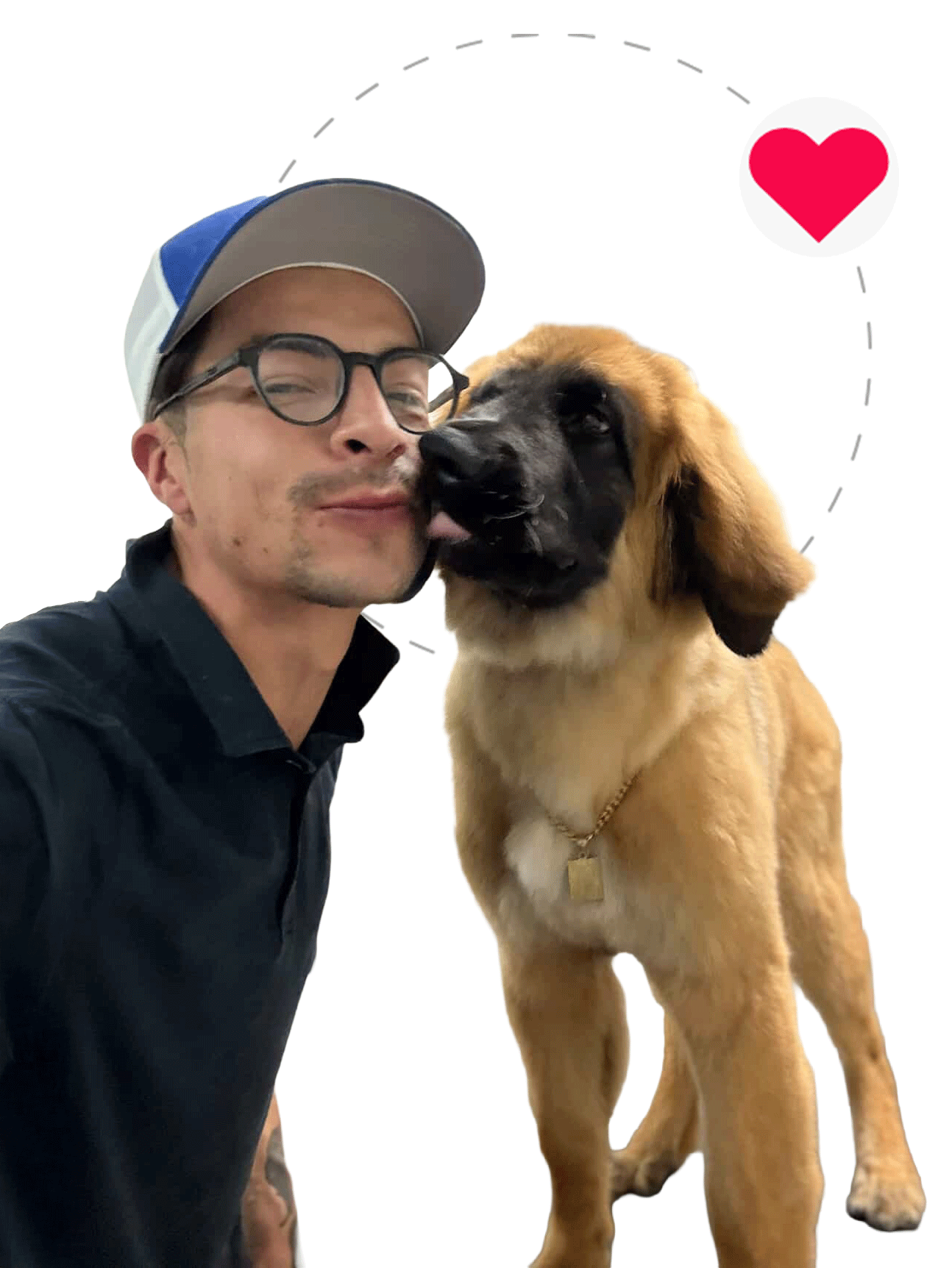 Marc Groomer wearing a black polo and blue/white hat, a dog is licking him on the face