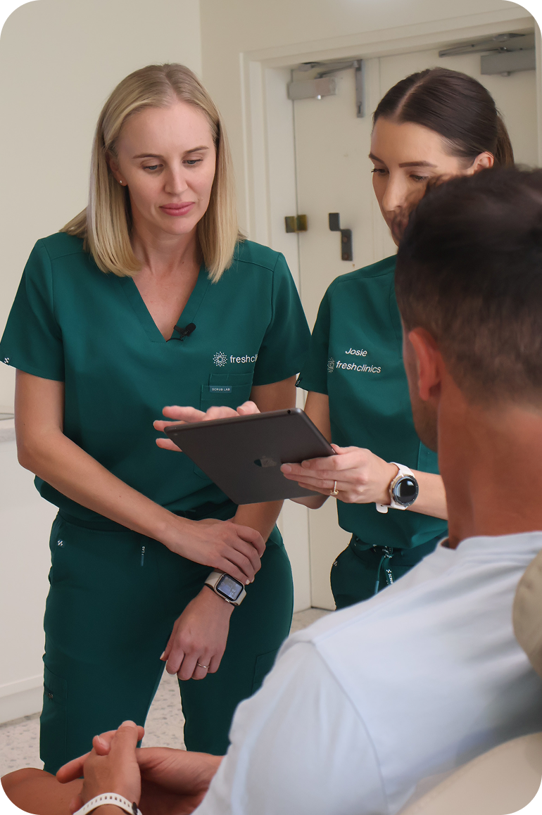 Fresh Clinics nurses reviewing a patient record in the Fresh app