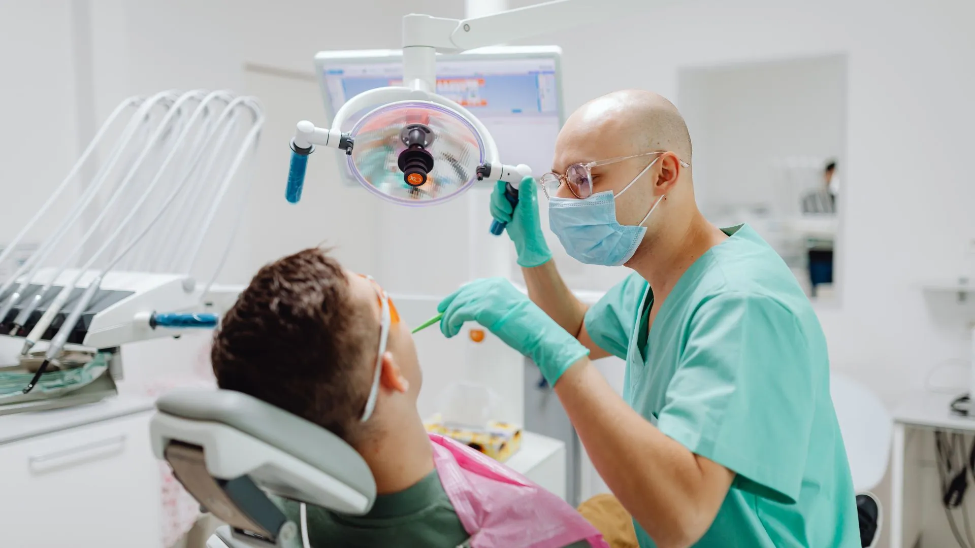 Dentist examining a patient for dental care and pharmacy support