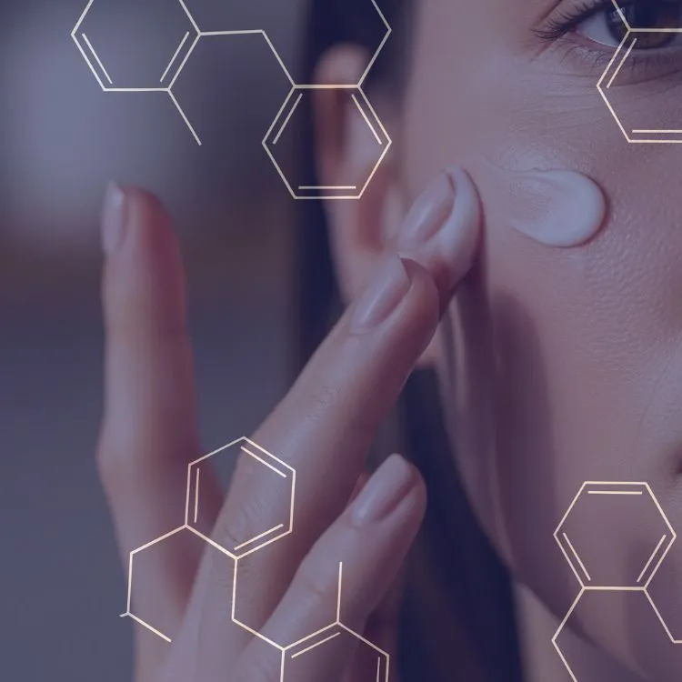 Close-up of a person applying cream on their cheek with hexagonal graphics overlay.