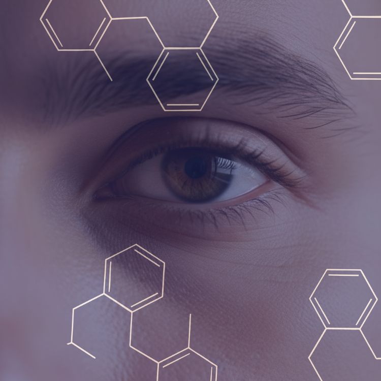 Close-up of a human eye with brown iris and eyebrow, overlaid with hexagonal chemical structures.