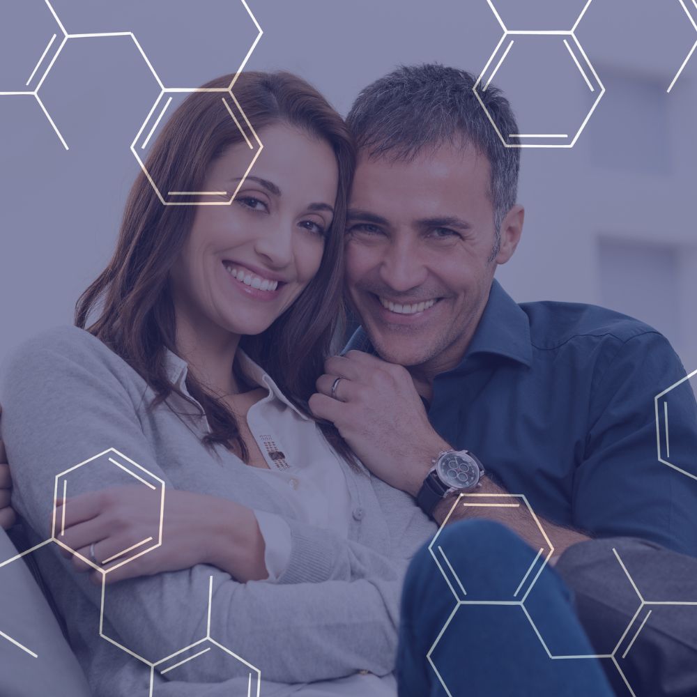 Pregnant woman gently cradling her belly surrounded by faint chemical structure illustrations.