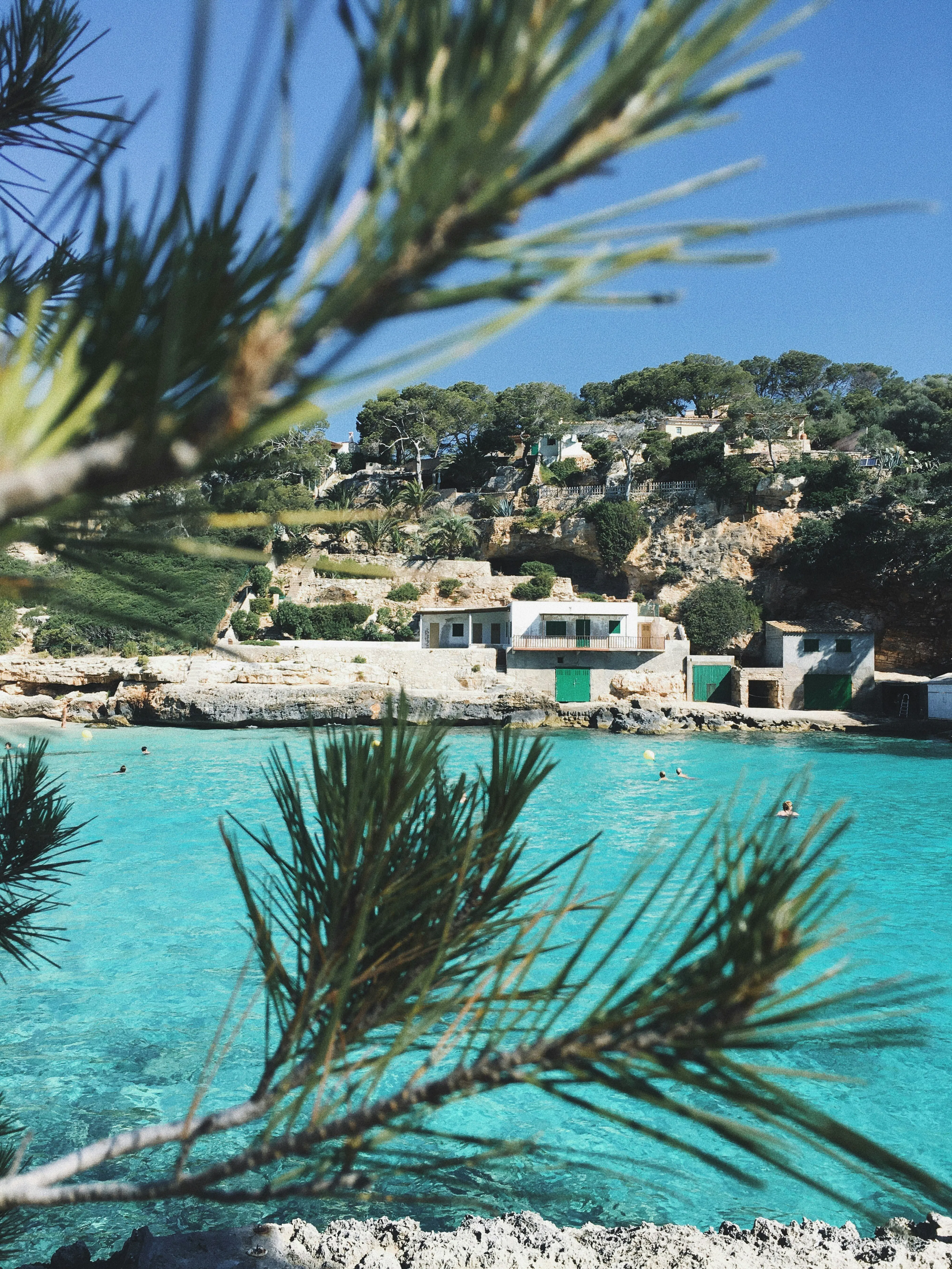 The crystal-clear turquoise waters of a secluded Mallorcan cala.