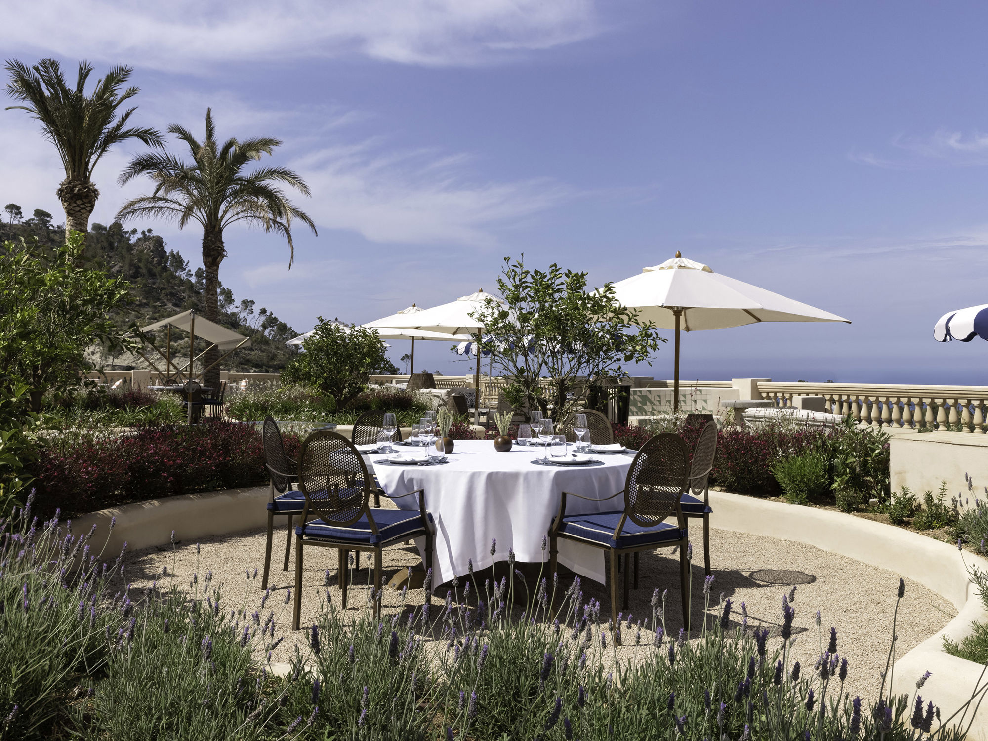 Sa Terrassa terrace prepared for outdoor dining at Son Bunyola