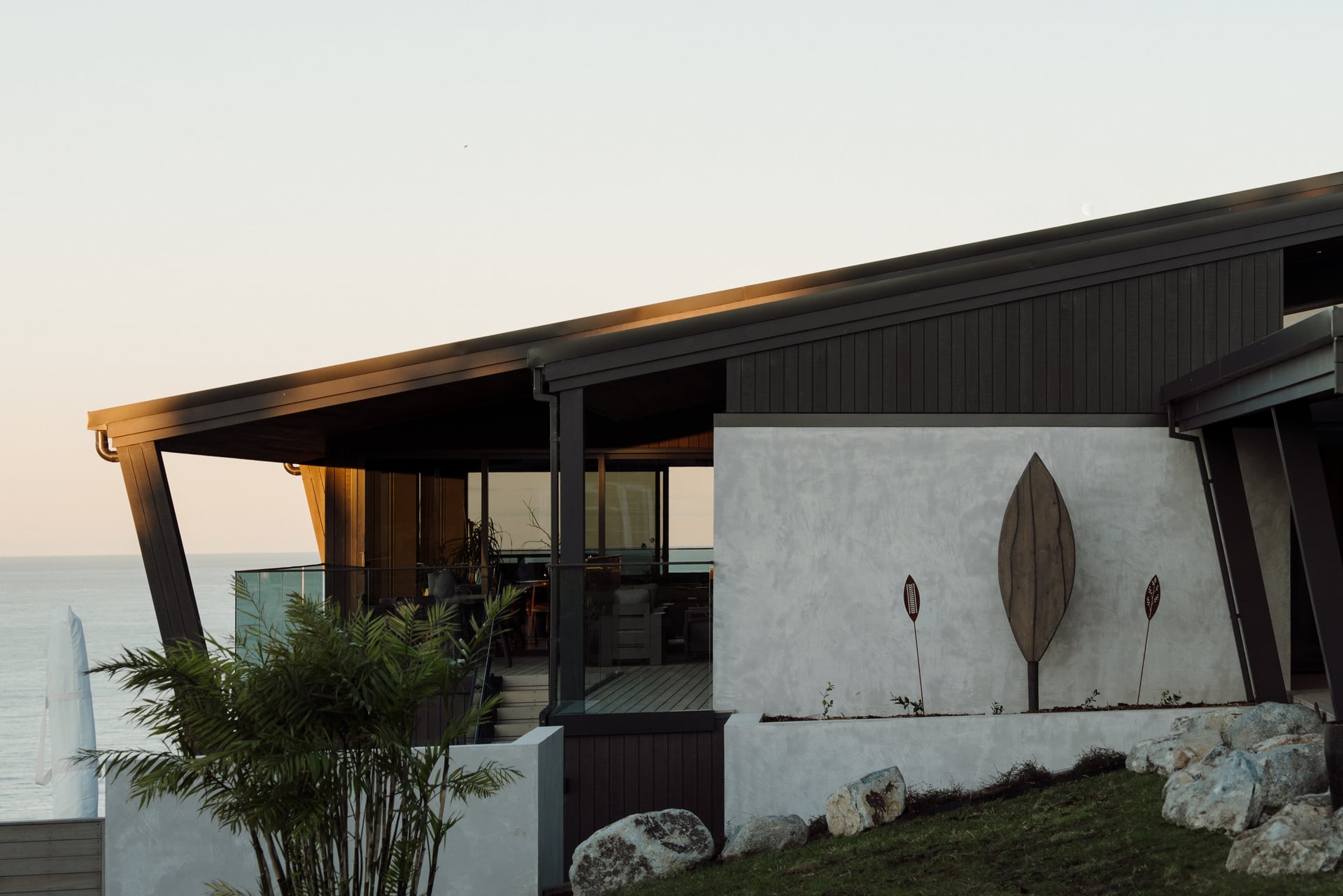Coastal home exterior at golden hour, construction videography by Onsite Media