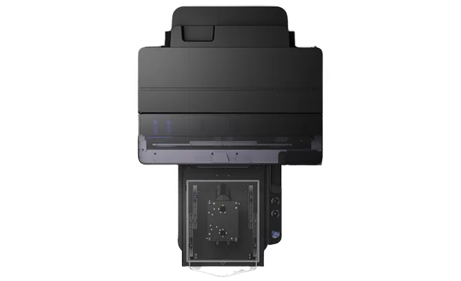 Top view of a modern black all-in-one printer with paper input tray and control buttons.