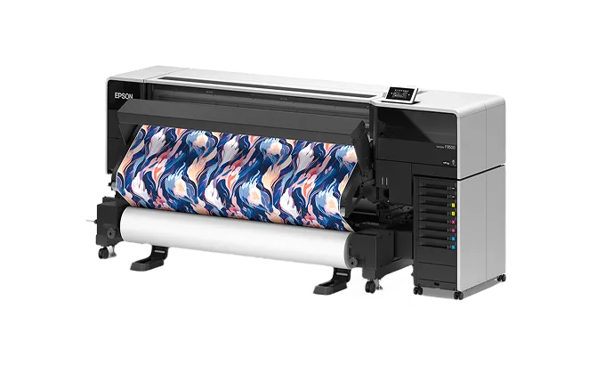 Epson large format printer printing vibrant fabric with abstract blue and pink pattern.