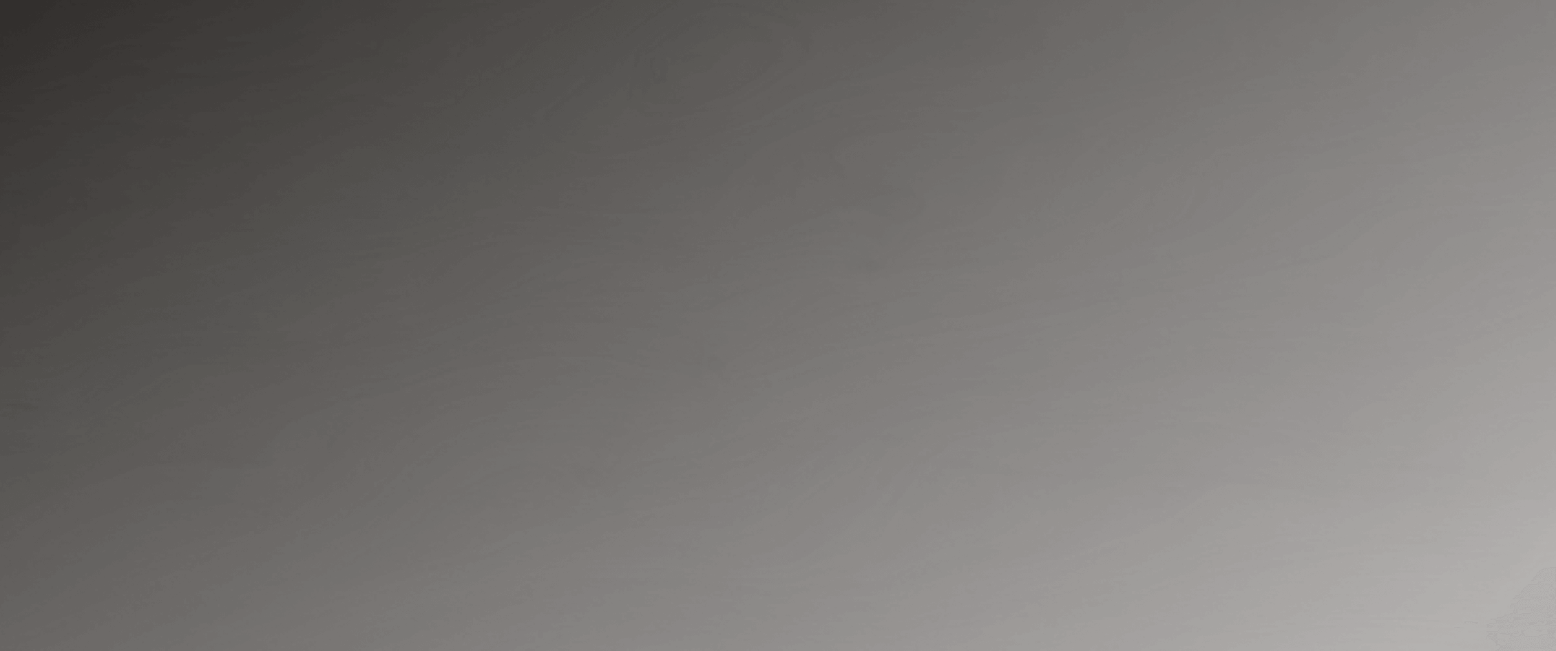 Gray gradient background with a subtle hexagonal pattern on the bottom right corner.