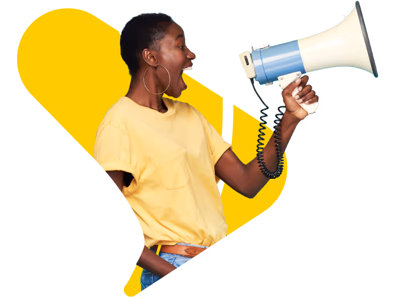 Woman in yellow shirt shouting enthusiastically into a blue and white megaphone.