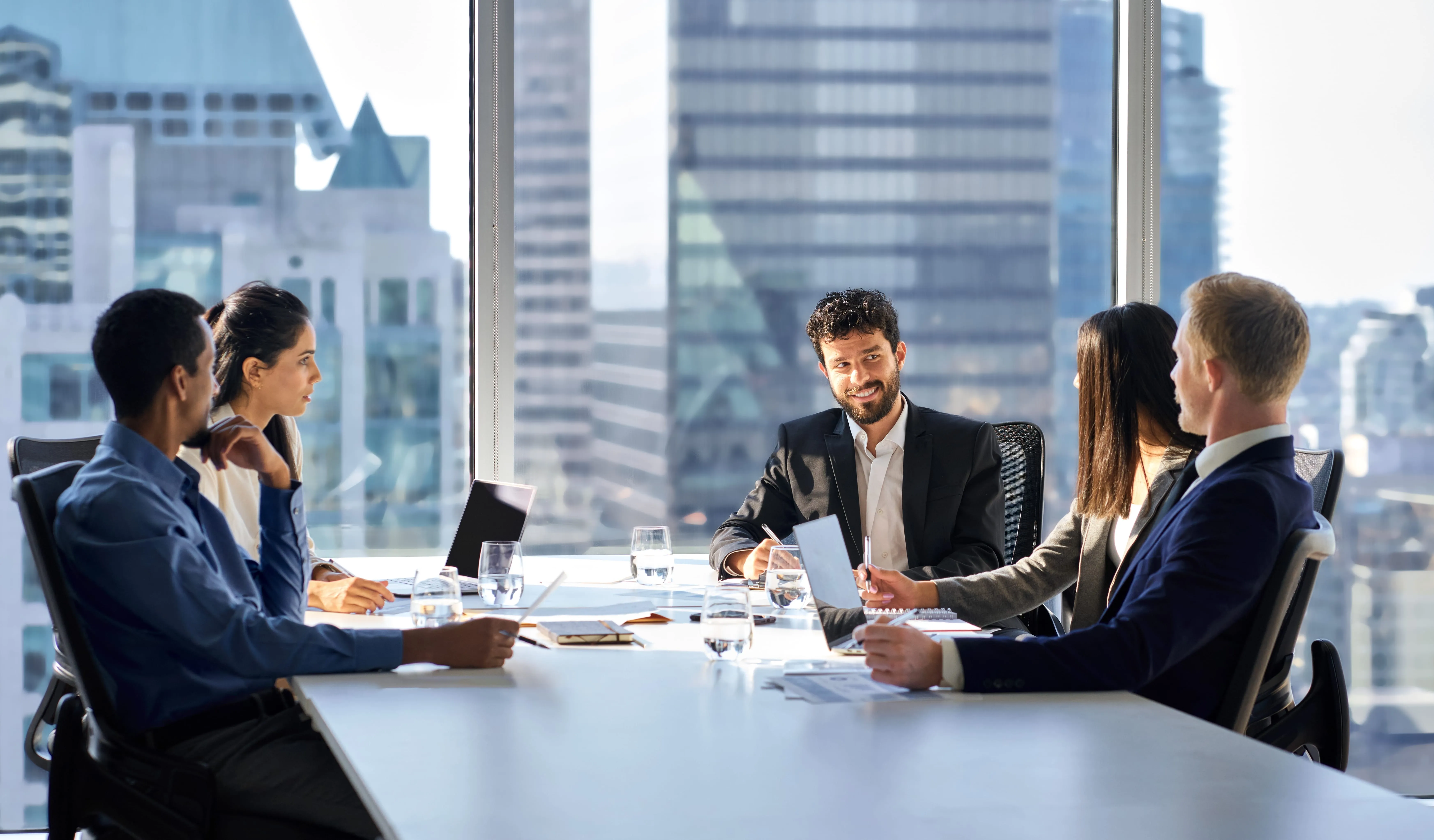 team members sitting in the meeting room