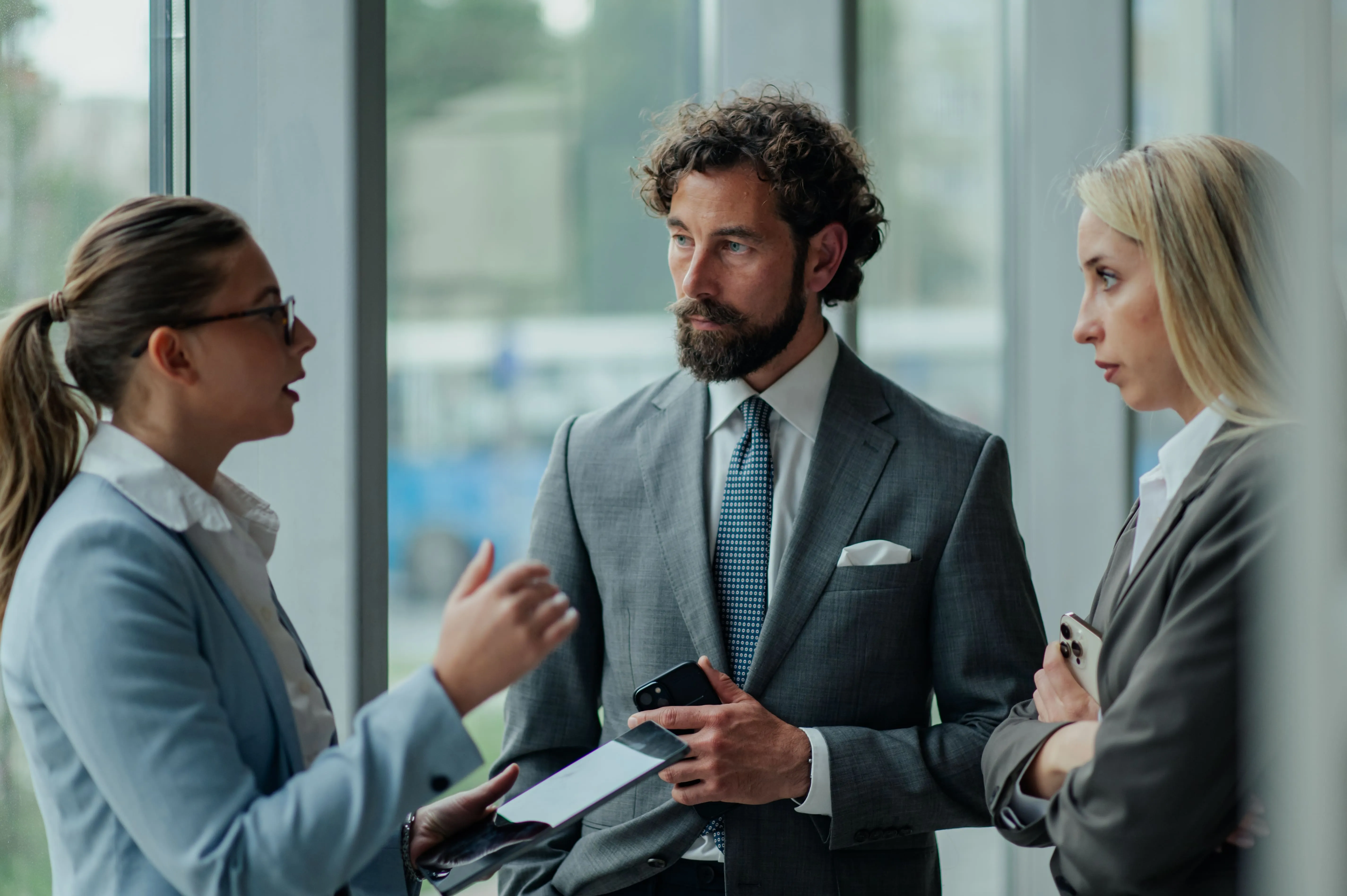 a businessman talking with his clients