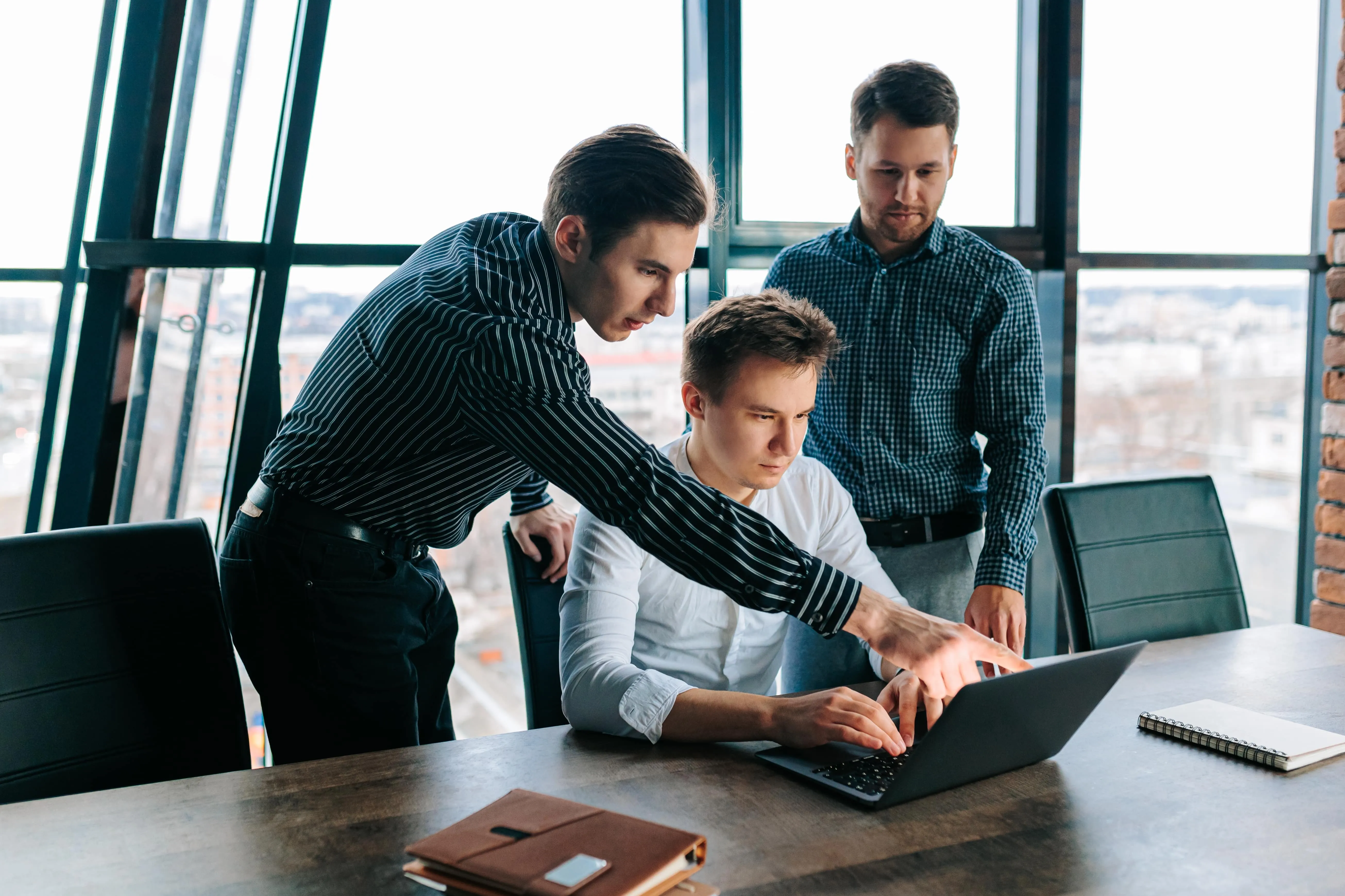 a senior worker giving advice to the junior