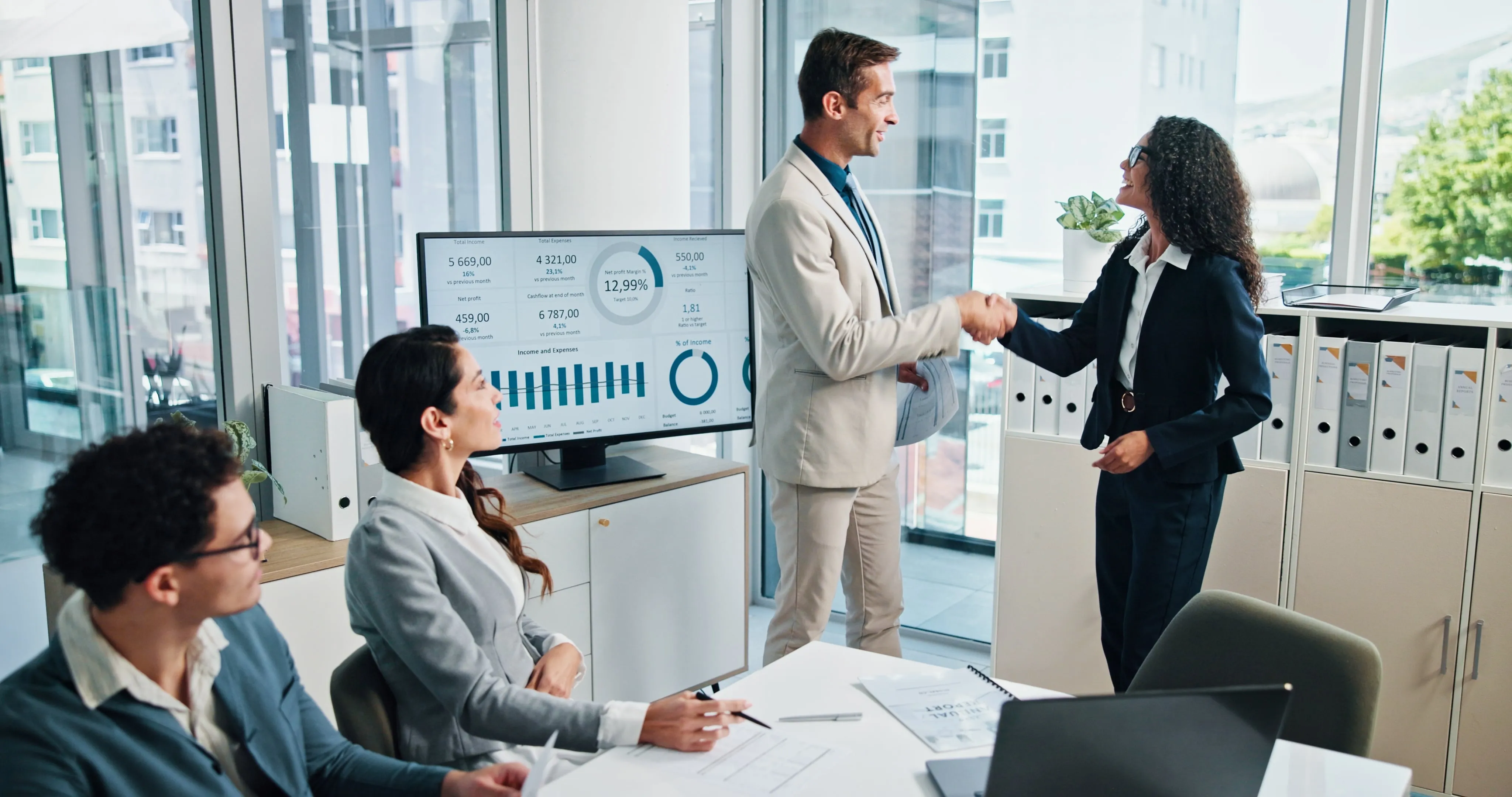 a handshake between a team-member and the team-lead