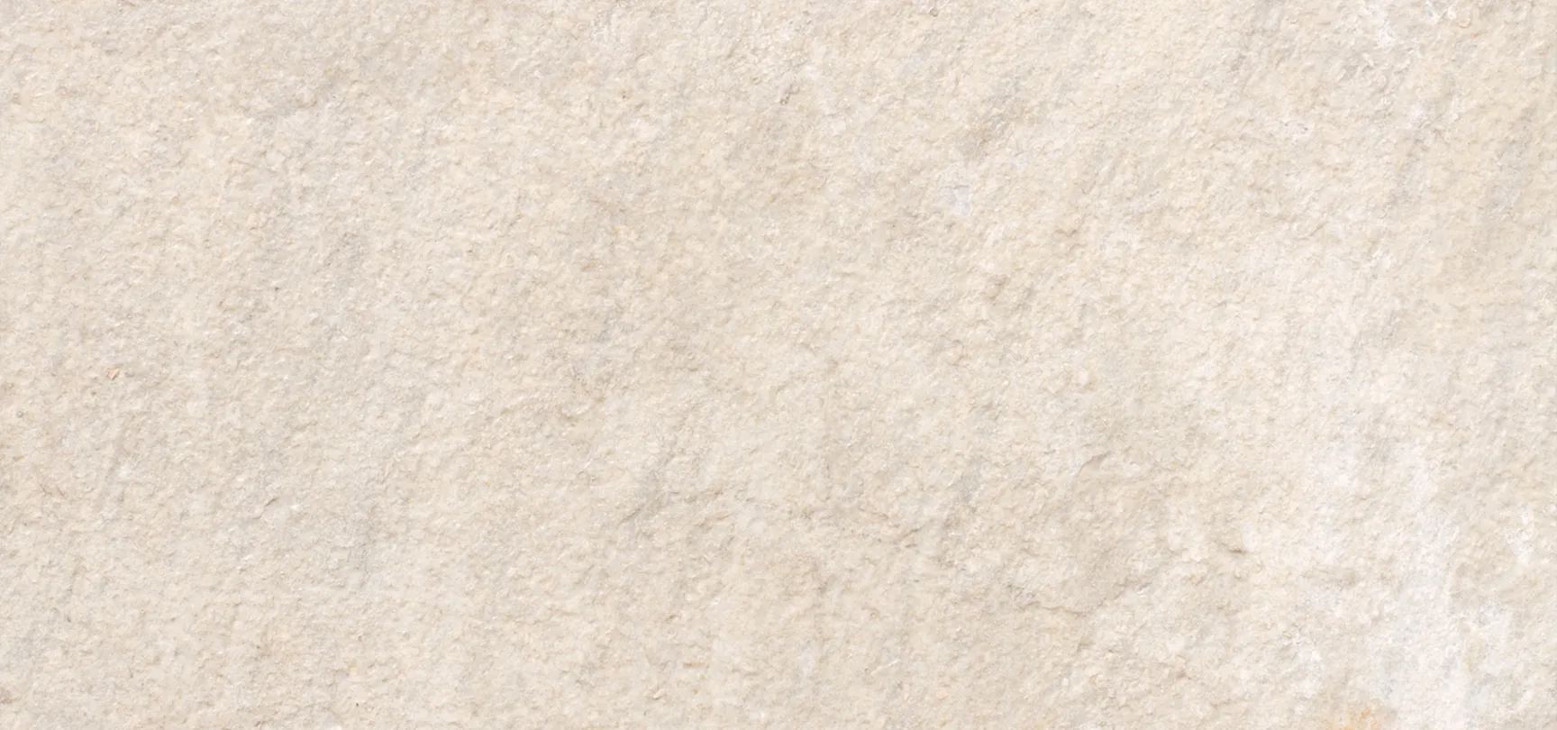 A close up of a white marble surface.