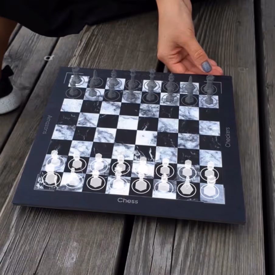 Two players, different games — same checkerboard.
So why add extra menus when you can simply rotate the board to make a selection?
Physical interaction just works in AR.