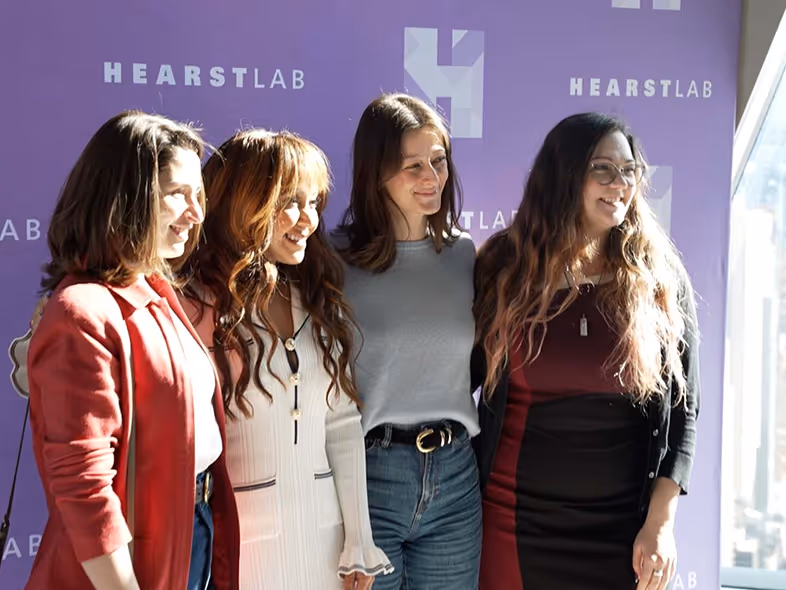 Various pictures depicting Ventures companies, HearstLab showcase and a HearstLab company.