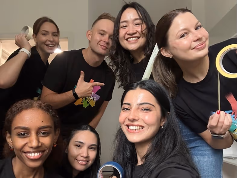 Various images of A+E Global Media logos, Hearst Canvas logo, Esquire cover pages and Fitch colleagues in new offices.