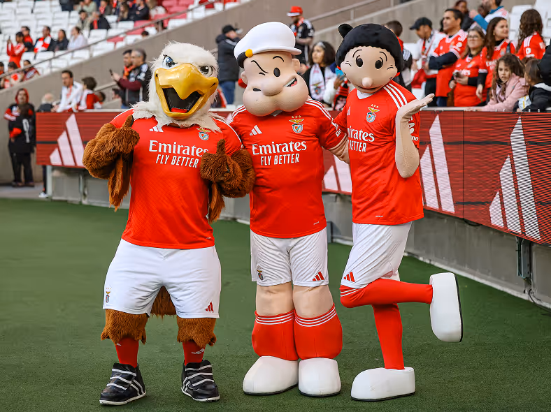 Various images of A+E Global Media logos, Hearst Canvas logo, Esquire cover pages and Fitch colleagues in new offices.