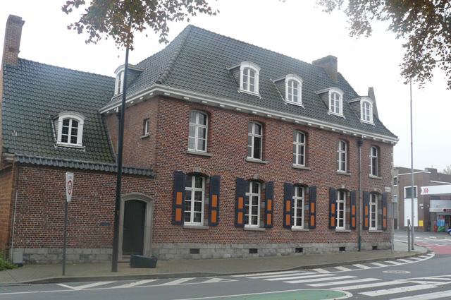 Later, architect Charles Hoge converted it, preserving historic elements like 1643 ceiling beams.