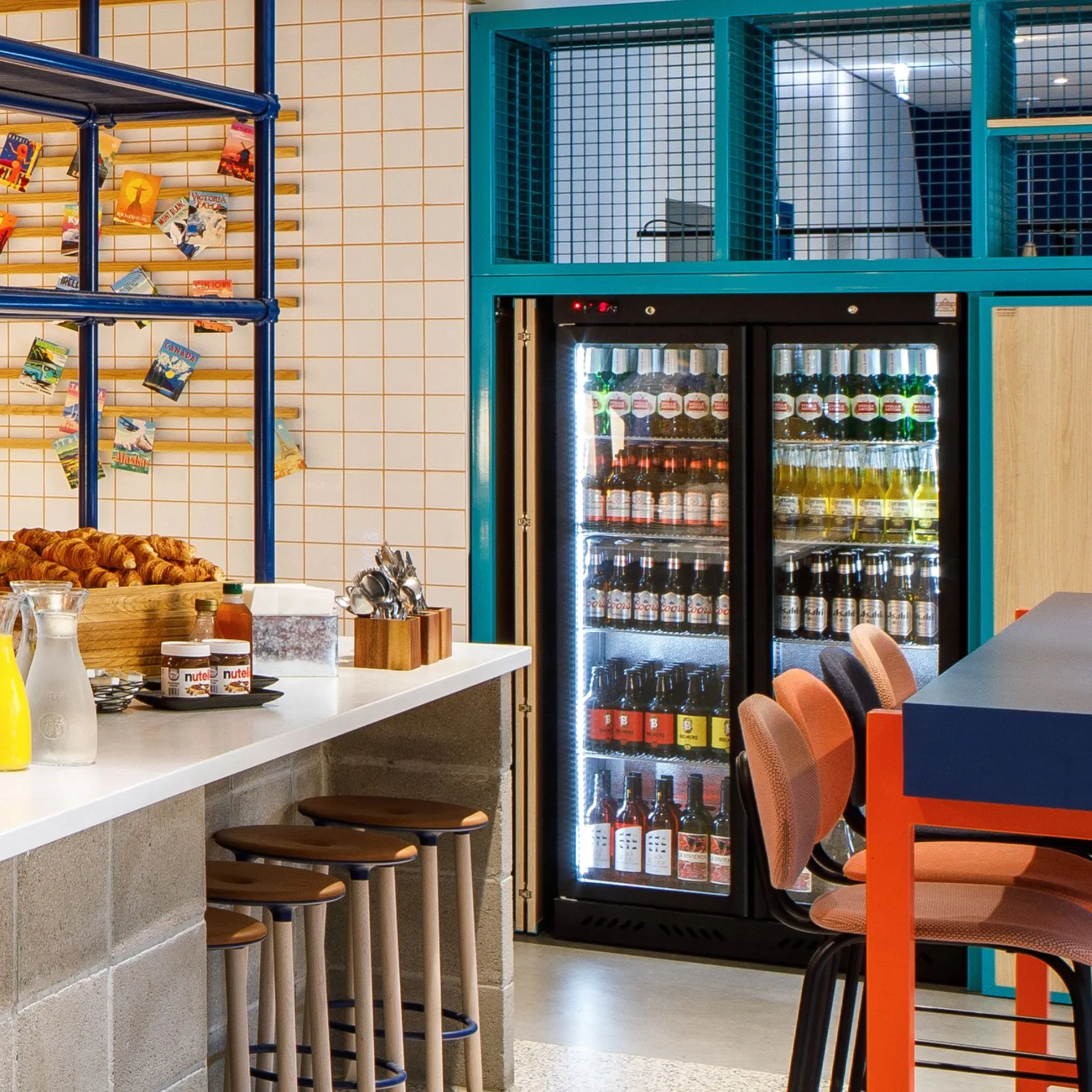 Bar area showing a small fridge with drinks at Ibis Budget Hotel Manchester Airport