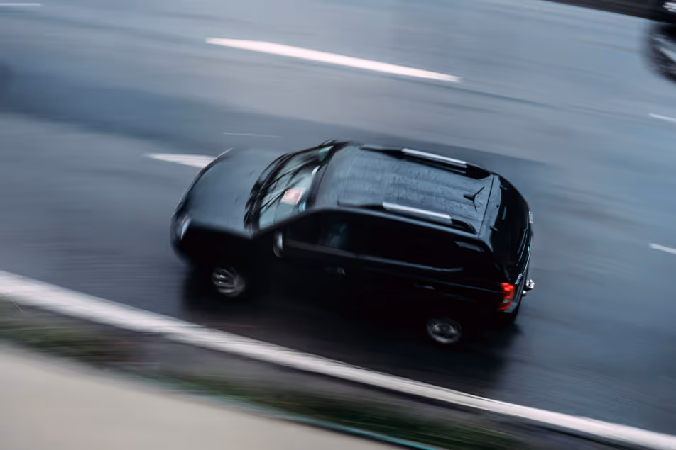 Black SUV car in the motor way