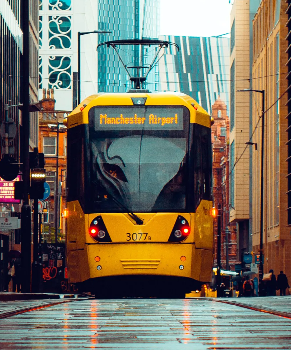 Front view of the Manchester tram in the city centre.