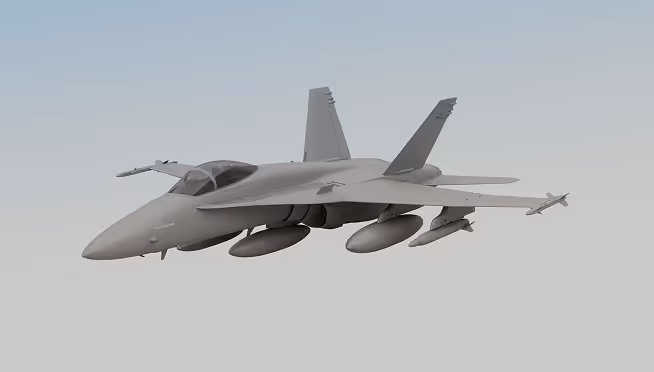 Gray military fighter jet flying against a pale blue sky.