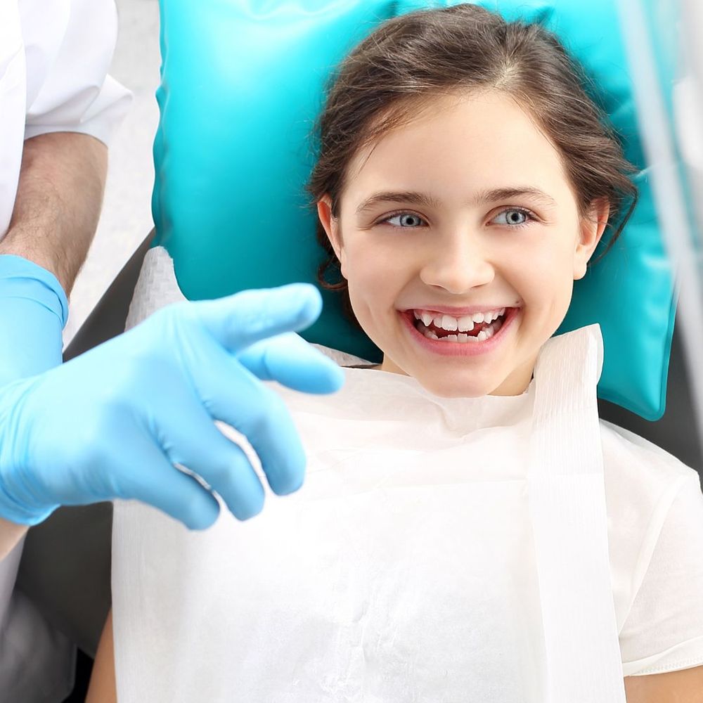 young girl getting dental sealants