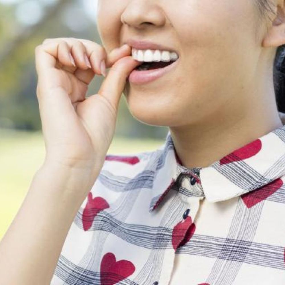 Child putting in Invisalign trays