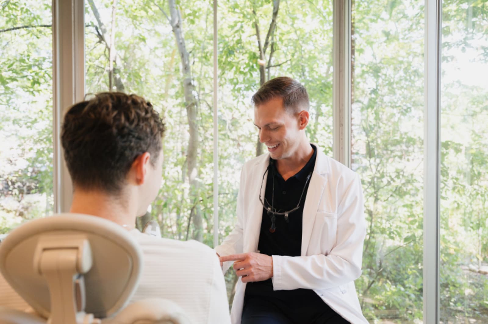 Dentist conducting thorough examination of patient in clinical setting