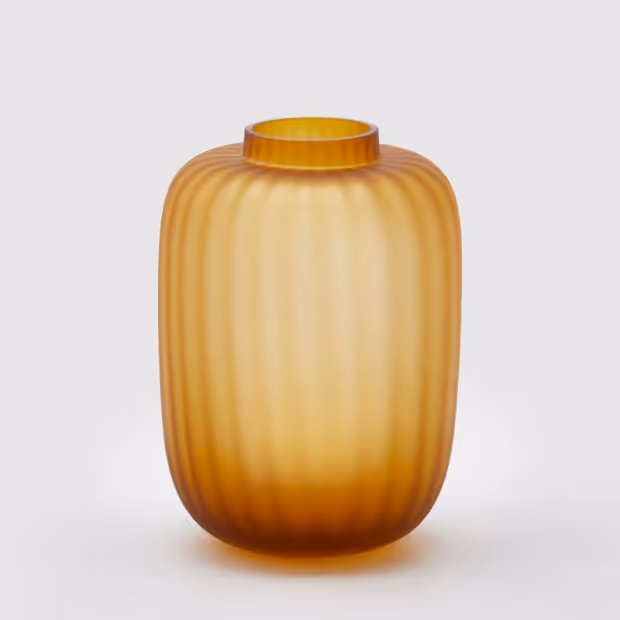 Matt dark yellow vase on a white background