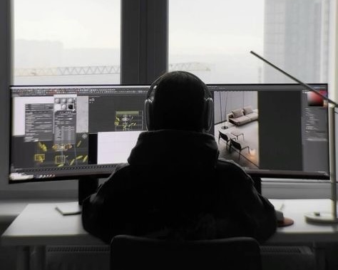 Person wearing headphones working on a dual-monitor setup displaying 3D design and interior rendering software.