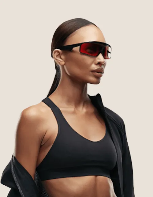 Yoga instructor wearing sunglasses and black outfit