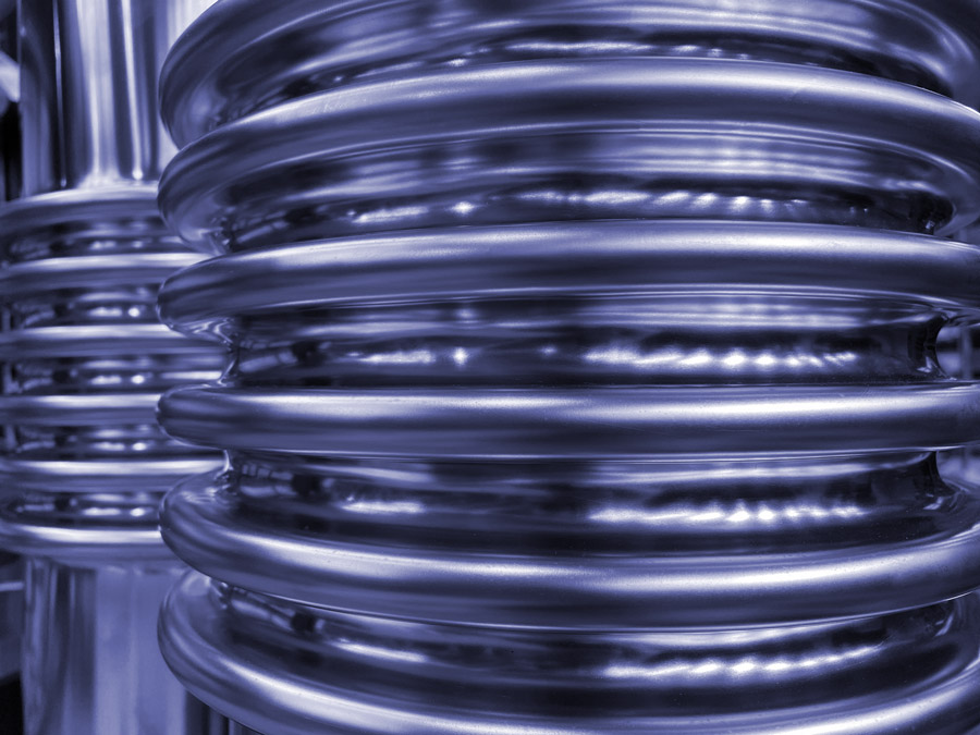 Close-up for two metal bellows.